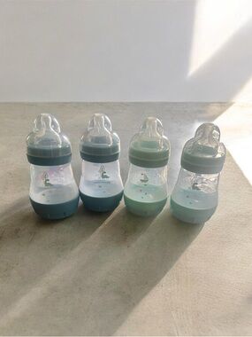 Unbranded Mint and Teal Baby Bottles - Set of 4